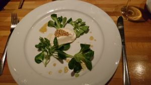 Bregenzerwald goat's cream cheese gratinated with honey and nuts, on lamb's lettuce with Modenese dressing